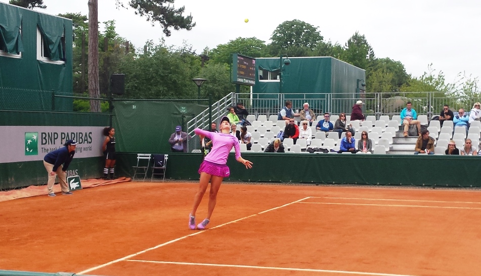 Zhuk serving an ace at 4-4, 15-all